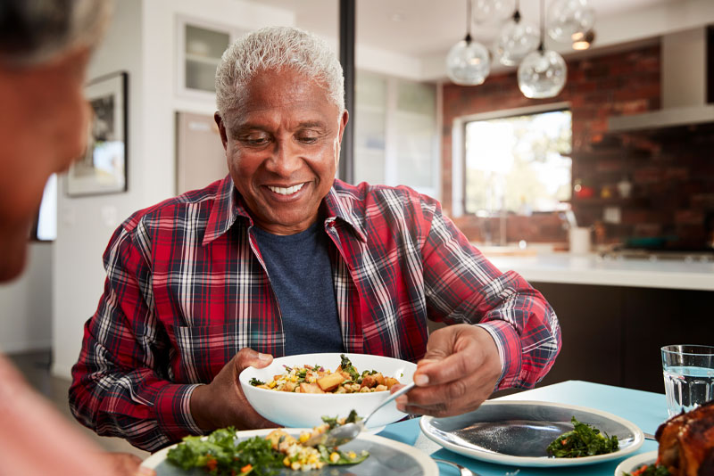 a dental implants patient eating