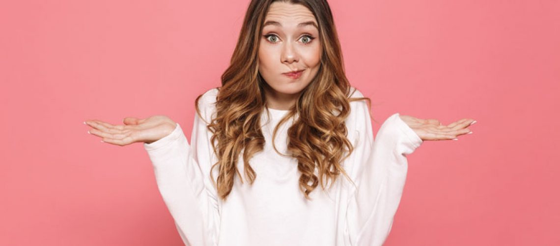 Questioning Dental Patient Before Her Dental Implant Procedure